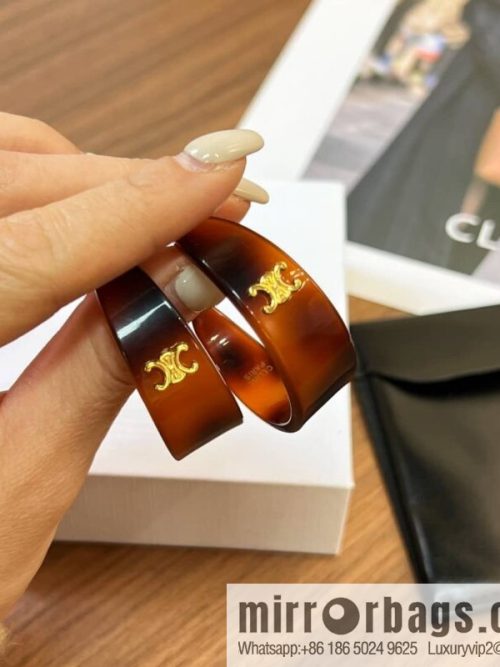 New Celine Arc de Triomphe half-bend earrings