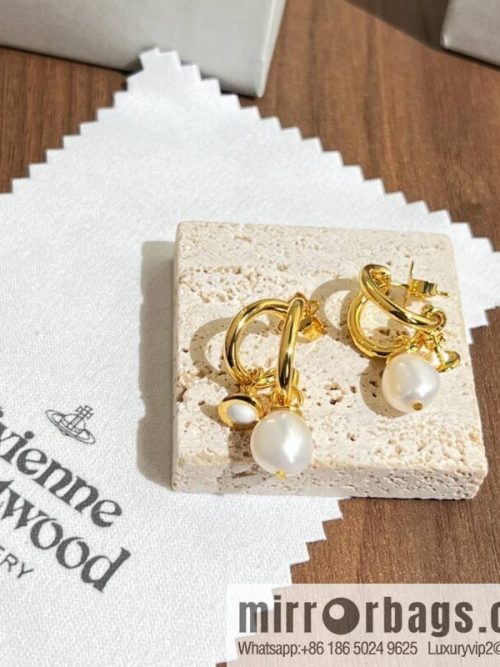 New ☑️ Vivienne Westwood gold Saturn pearl stud earrings
