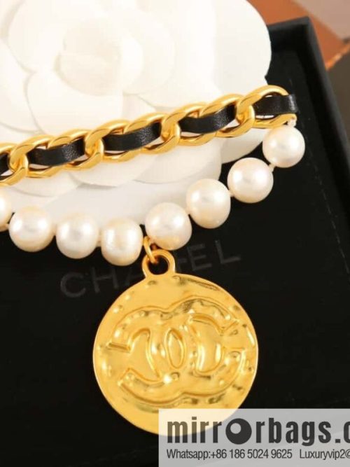 New ☑️ Chanel medieval series gold round double c pearl black leather rope brooch