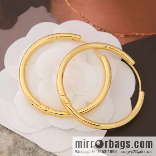 New ☑️ Chanel medieval series gold round earrings stud earrings