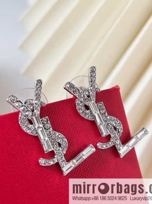 Saint Laurent silver YSL stud earrings