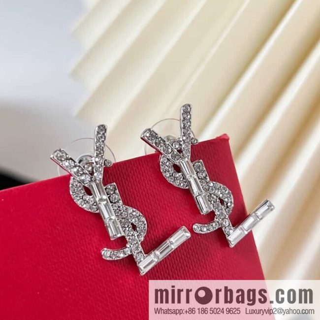 Saint Laurent silver YSL stud earrings