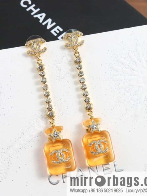 New ☑️ Chanel c2 double c orange yellow perfume bottle stud earrings