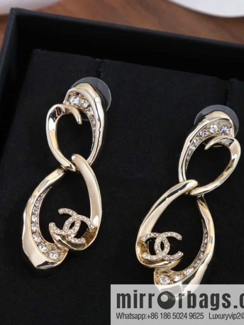 New ☑️ chanel c2 double c oval hollow stud earrings
