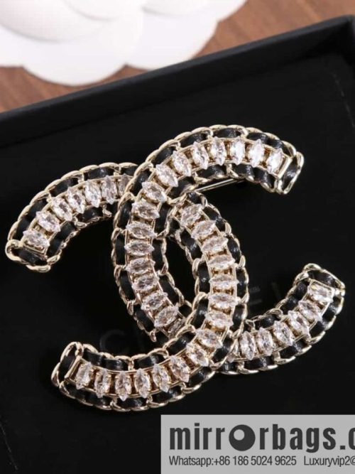 New ☑️ Chanel Double C Horse Eye Diamond Black Leather Rope Brooch
