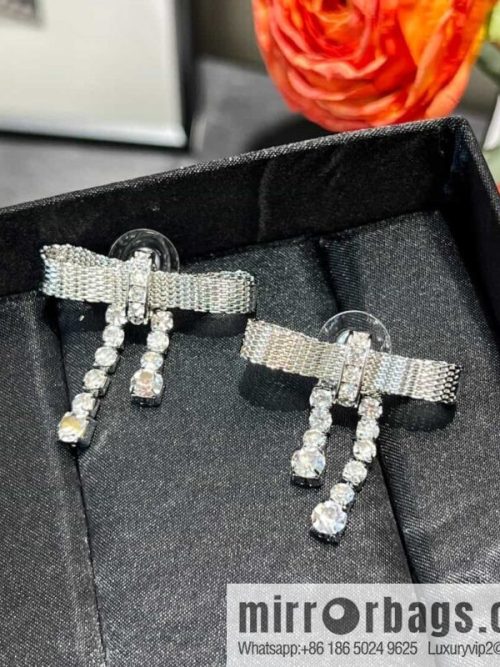 MIU MIU Miu Miu bow fringed stud earrings