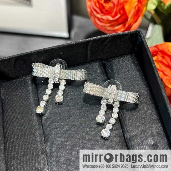 MIU MIU Miu Miu bow fringed stud earrings
