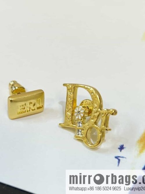 New ☑️ DIOR asymmetrical letter stud earrings