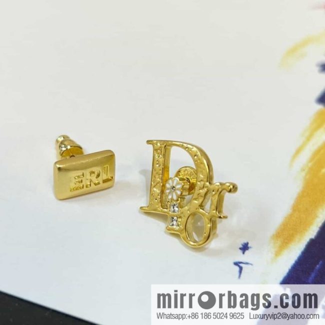 New ☑️ DIOR asymmetrical letter stud earrings