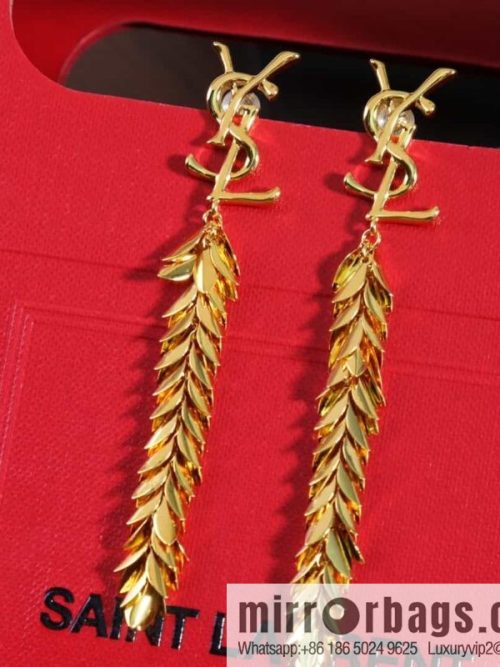 Saint Laurent YSL gold fringed leaf stud earrings
