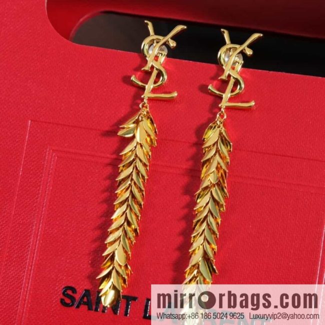 Saint Laurent YSL gold fringed leaf stud earrings