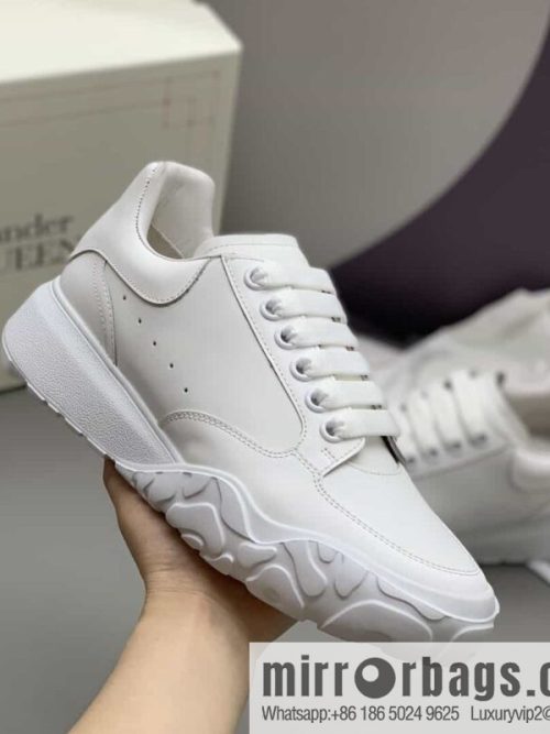 Alexander McQueen with leather heels and leather patchwork His & Hers sneakers
