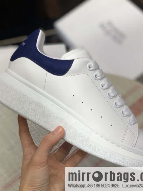 Alexander McQueen dark blue velvet tail sneakers