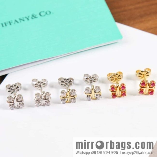 New ☑️ Tiffany & Co. Tiffany color cross stud earrings