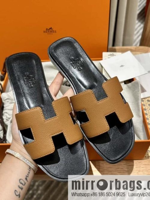 Hermès leather outsole H slippers, black and brown.