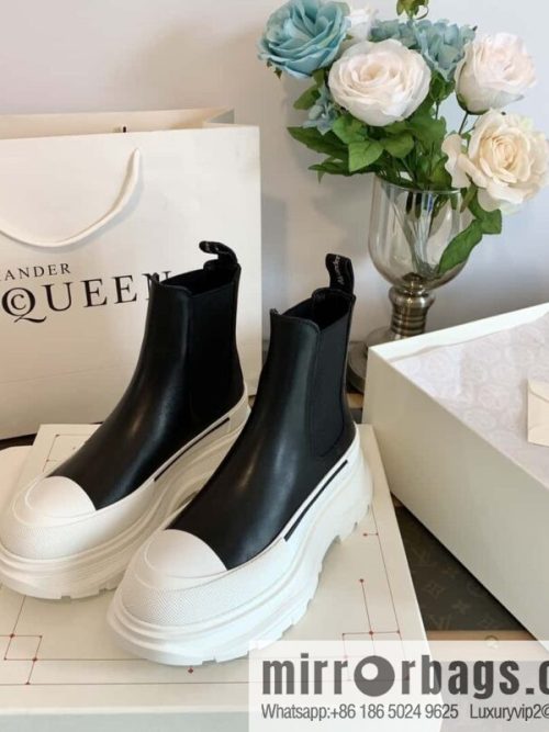 Alexander McQueen, platform black and white Chelsea booties