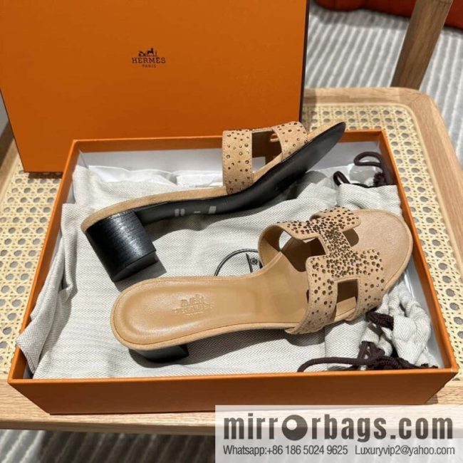 Hermes, the classic new diamond-faced H slippers.